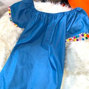 denim print mini dress with pom-pom